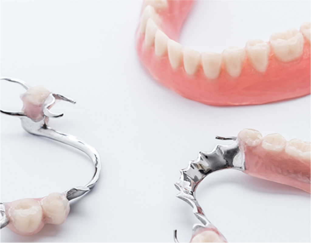 Complete or partial dentures